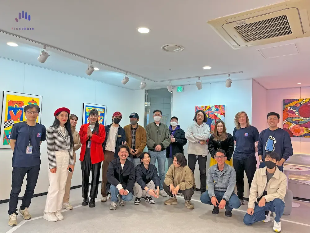 Group photo of FingeRate X exhibition visitors and staff